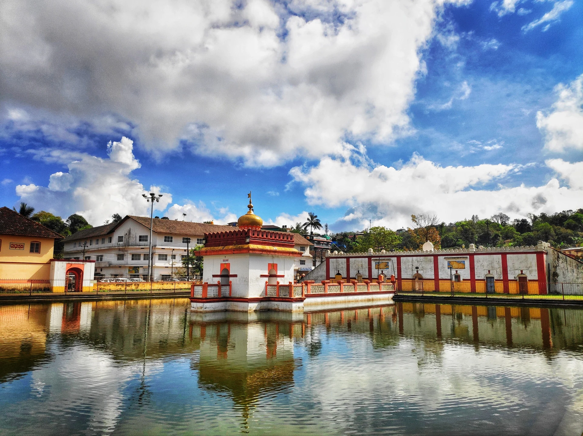 Omkareshwara Temple and its reflection in the temple tank in Madikeri