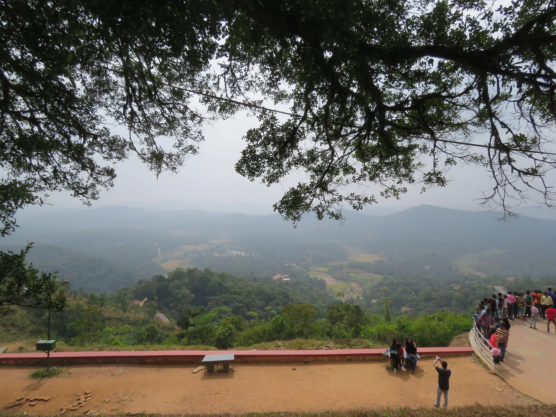 Layered green hills and valley seen from Raja's Seat in Madikeri