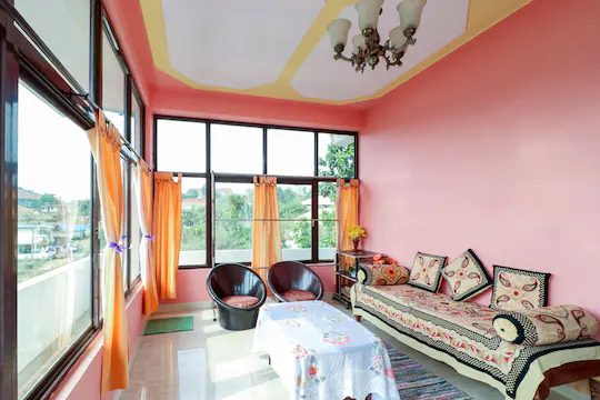 Lobby lounge seating at Saboath Homestay